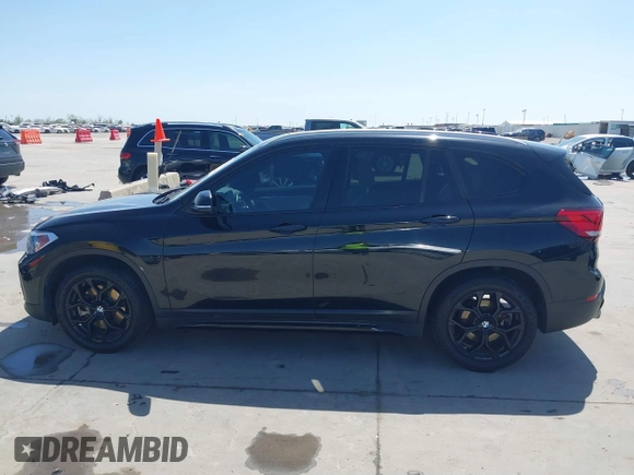 2021 BMW X1 sDrive28i with VIN WBXJG7C07M3M65841, listed as a IAAI auction lot 41877032 with 79,817 mi miles and . Bid and sale history available at DreamBid. Image 14.