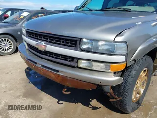 2003 Chevrolet Suburban Z71 with VIN 3GNFK16Z33G253479, listed as a IAAI auction lot 41871504 with 157,990 mi miles and . Bid and sale history available at DreamBid. Image 6.
