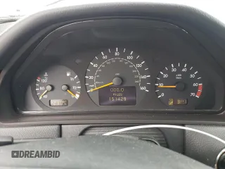 2002 Mercedes-Benz E-Class with VIN WDBJF65J42B486633, listed as a Copart auction lot 76979054 with 151,429 mi miles and Salvage Title. Bid and sale history available at carsss.com. Image 9.
