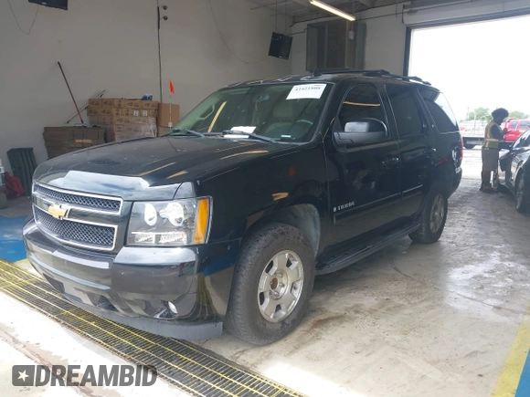2007 Chevrolet Tahoe LT with VIN 1GNFC13037J129669, listed as a IAAI auction lot 42421808 with 268,523 mi miles and . Bid and sale history available at DreamBid. Image 2.