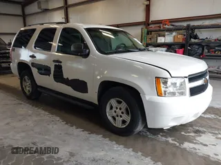 2007 Chevrolet Tahoe LS z VIN 1GNFC13C47R323753, wystawiony jako IAAI lot #42449021 z przebiegiem 185 852 mil mil oraz . Historia ofert i sprzedaży dostępna na DreamBid. Obrazek 1.