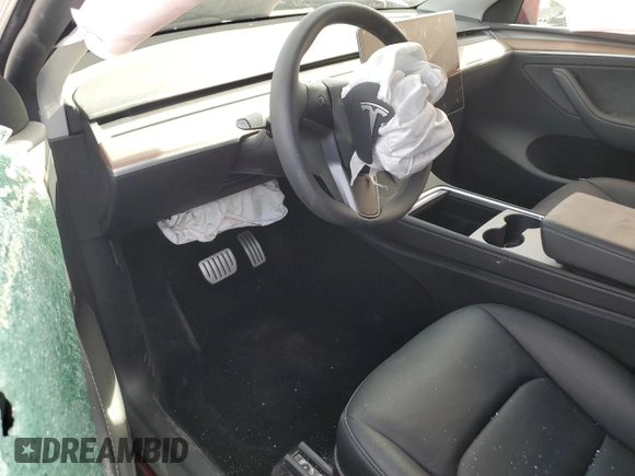 2024 Tesla Model Y Performance z VIN 7SAYGDEF7RF128112, wystawiony jako Copart lot #85596764 z przebiegiem Nie podano mil oraz Szkoda całkowita • Salvage title. Historia ofert i sprzedaży dostępna na DreamBid. Obrazek 8.