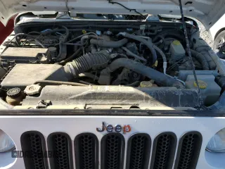 2008 Jeep Wrangler X with VIN 1J4FA24108L642938, listed as a Copart auction lot 55653525 with 119,424 mi miles and Salvage title. Bid and sale history available at DreamBid. Image 11.
