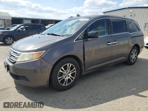 2011 Honda Odyssey EX-L with VIN 5FNRL5H61BB056652, listed as a Copart auction lot 54774015 with 233,125 mi miles and Salvage Title. Bid and sale history available at DreamBid. Image 1.