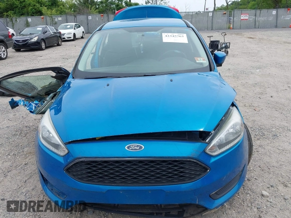2015 Ford Focus SE z VIN 1FADP3F26FL252212, wystawiony jako IAAI lot #42345763 z przebiegiem 102 549 mil mil oraz . Historia ofert i sprzedaży dostępna na DreamBid. Obrazek 12.