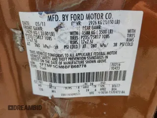 2011 Ford F-150 XL with VIN 1FTMF1CM8BFB68778, listed as a Copart auction lot 56981465 with 93,351 mi miles and Salvage title. Bid and sale history available at DreamBid. Image 12.