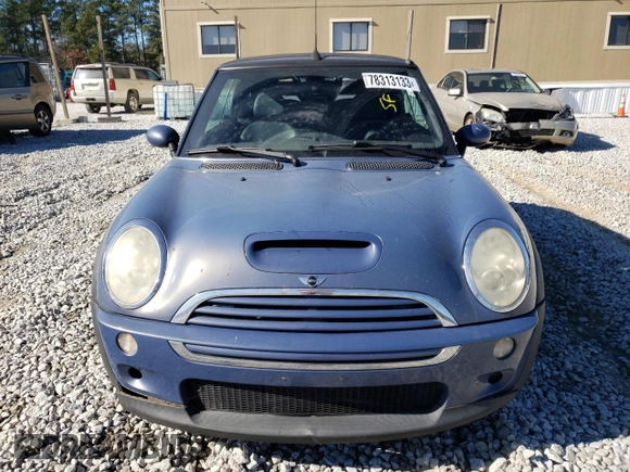 2007 MINI Convertible S with VIN WMWRH33547TL93855, listed as a Copart auction lot 78313133 with 130,832 mi miles and Salvage title. Bid and sale history available at DreamBid. Image 5.