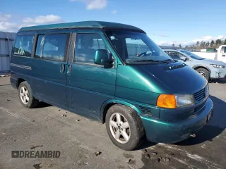 2003 Volkswagen EuroVan MV с VIN WV2NB47033H029173, выставлен на аукционе Copart как лот 82377584 с пробегом 231 083 миль миль и Чистый • Clean title. История ставок и продаж доступна на DreamBid. Изображение 4.