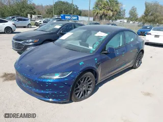 2025 Tesla Model 3 Long Range with VIN 5YJ3E1EB4SF876945, listed as a IAAI auction lot 41518965 with 591 mi miles. Bid and sale history available at carsss.com. Image 2.