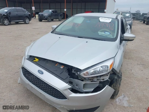 2016 Ford Focus SE with VIN 1FADP3F23GL316269, listed as a IAAI auction lot 41634634 with 71,617 mi miles. Bid and sale history available at carsss.com. Image 2.