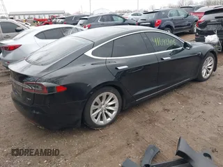 2017 Tesla Model S 100D with VIN 5YJSA1E25HF215778, listed as a IAAI auction lot 41692605 with Not Provided miles and . Bid and sale history available at DreamBid. Image 4.