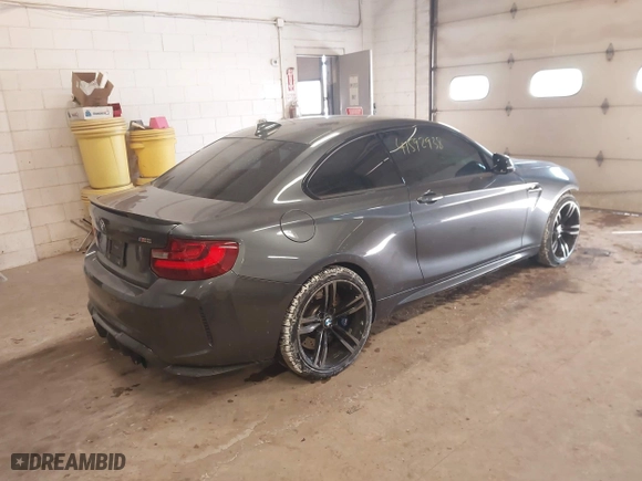2017 BMW M2 with VIN WBS1H9C36HV888803, listed as a IAAI auction lot 41592938 with 71,762 mi miles. Bid and sale history available at carsss.com. Image 4.