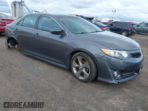 2014 Toyota Camry L with VIN 4T1BF1FK9EU818893, listed as a IAAI auction lot 42051996 with 125,924 mi miles. Bid and sale history available at carsss.com. Image 1.