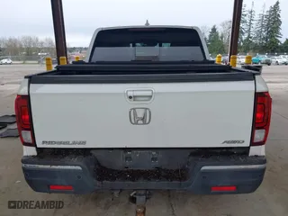 2017 Honda Ridgeline RTL-E with VIN 5FPYK3F7XHB030551, listed as a IAAI auction lot 41903844 with 153,594 mi miles. Bid and sale history available at carsss.com. Image 16.
