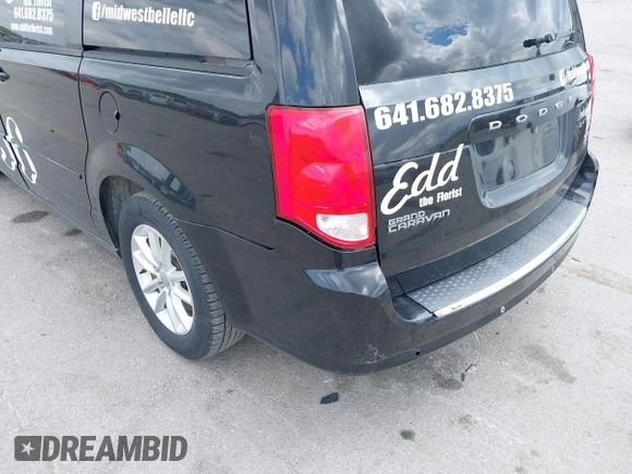 2014 Dodge Grand Caravan SXT z VIN 2C4RDGCGXER388459, wystawiony jako IAAI lot #42350937 z przebiegiem 149 276 mil mil oraz . Historia ofert i sprzedaży dostępna na DreamBid. Obrazek 14.