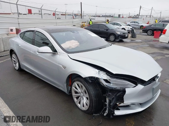 2016 Tesla Model S 70 with VIN 5YJSA1E17GF156514, listed as a IAAI auction lot 41869006 with 17,704 mi miles and . Bid and sale history available at DreamBid. Image 1.