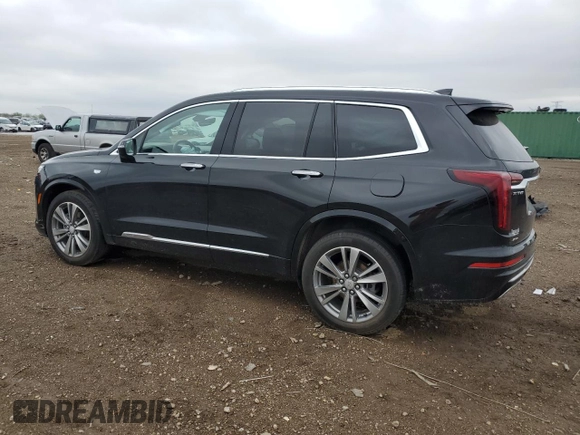 2022 Cadillac XT6 Premium Luxury z VIN 1GYKPFRS9NZ103281, wystawiony jako Copart lot #55118485 z przebiegiem 52 413 mil mil oraz Szkoda całkowita • Salvage title. Historia ofert i sprzedaży dostępna na DreamBid. Obrazek 2.