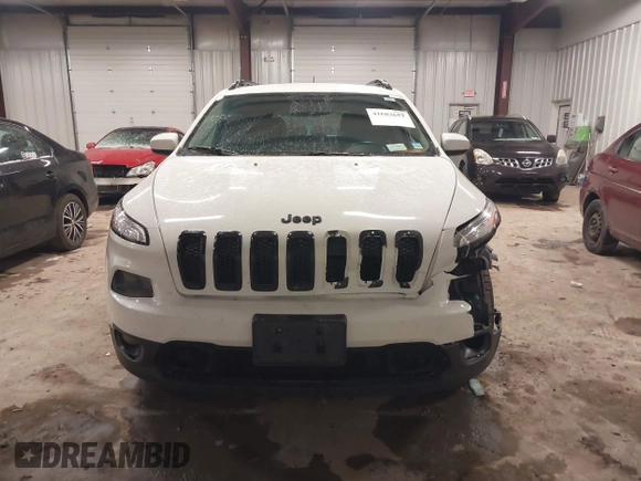 2016 Jeep Cherokee Latitude with VIN 1C4PJMCB0GW226093, listed as a IAAI auction lot 41683652 with 130,168 mi miles and . Bid and sale history available at DreamBid. Image 12.