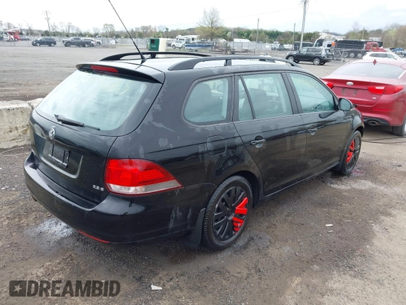 2010 Volkswagen Jetta SportWagen S with VIN 3VWKX7AJ2AM613348, listed as a IAAI auction lot 41941425 with 153,878 mi miles. Bid and sale history available at carsss.com. Image 4.