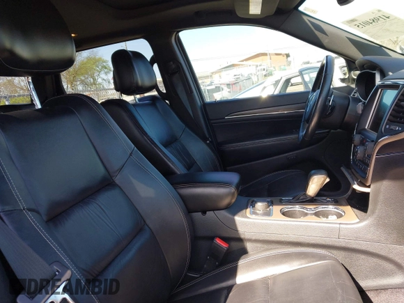 2016 Jeep Grand Cherokee Limited 75th Anniversary with VIN 1C4RJFBG0GC359648, listed as a IAAI auction lot 41984015 with 126,159 mi miles and . Bid and sale history available at DreamBid. Image 5.