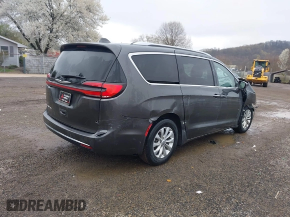 2021 Chrysler Pacifica Touring L with VIN 2C4RC1BG7MR584956, listed as a IAAI auction lot 42016887 with 51,415 mi miles and . Bid and sale history available at DreamBid. Image 4.
