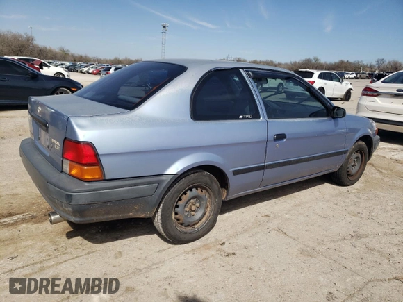 1997 Toyota Tercel CE z VIN JT2AC52L7V0212023, wystawiony jako Copart lot #49150285 z przebiegiem 74 742 mil mil oraz Czysty tytuł • Clean title. Historia ofert i sprzedaży dostępna na DreamBid. Obrazek 3.