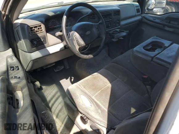 2002 Ford F-250 XL z VIN 1FTNX21F42EC44207, wystawiony jako Copart lot #60615915 z przebiegiem 320 609 mil mil oraz Szkoda całkowita • Salvage title. Historia ofert i sprzedaży dostępna na DreamBid. Obrazek 8.