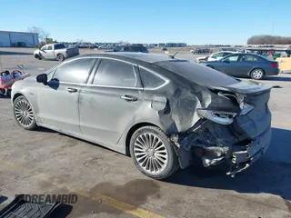 2014 Ford Fusion Titanium with VIN 3FA6P0K93ER293357, listed as a IAAI auction lot 41354955 with 176,130 mi miles. Bid and sale history available at carsss.com. Image 3.