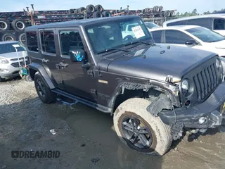 2018 Jeep Wrangler Unlimited Sport with VIN 1C4BJWDG9JL860947, listed as a IAAI auction lot 42551352 with 82,344 mi miles and . Bid and sale history available at DreamBid. Image 1.