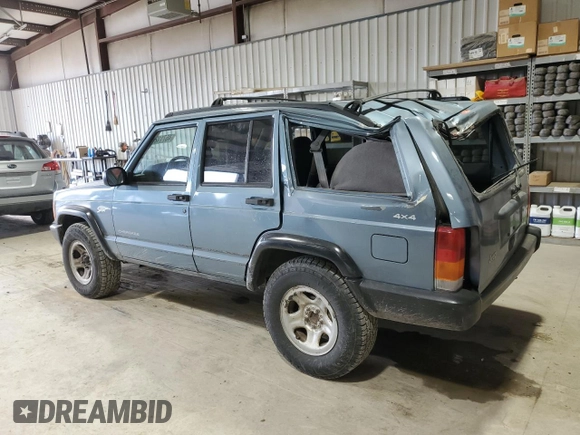 1997 Jeep Cherokee Sport with VIN 1J4FJ68S4VL532609, listed as a Copart auction lot 46711285 with 273,930 mi miles and Salvage Title. Bid and sale history available at carsss.com. Image 2.