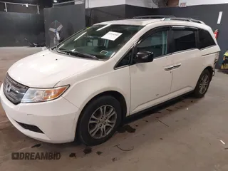 2013 Honda Odyssey EX-L with VIN 5FNRL5H66DB071151, listed as a IAAI auction lot 41914345 with 194,804 mi miles and . Bid and sale history available at carsss.com. Image 2.
