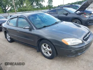2002 Ford Taurus SES Standard z VIN 1FAFP55U42A114570, wystawiony jako IAAI lot #42723316 z przebiegiem 120 191 mil mil oraz . Historia ofert i sprzedaży dostępna na DreamBid. Obrazek 1.