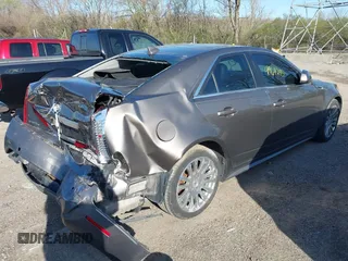 2012 Cadillac CTS Premium with VIN 1G6DS5E3XC0128264, listed as a IAAI auction lot 41964295 with 117,889 mi miles and . Bid and sale history available at DreamBid. Image 4.
