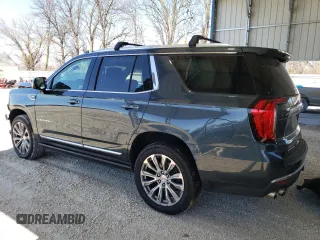 2021 GMC Yukon Denali with VIN 1GKS2DKLXMR387681, listed as a Copart auction lot 46830485 with 77,628 mi miles and Salvage Title. Bid and sale history available at carsss.com. Image 2.