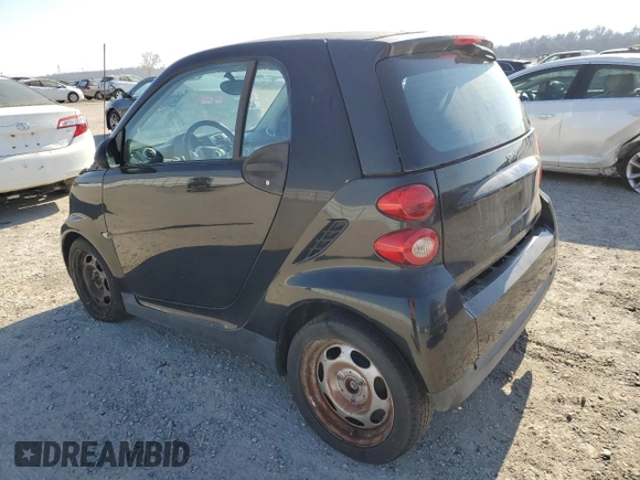 2012 Smart fortwo Pure z VIN WMEEJ3BA4CK572144, wystawiony jako Copart lot #42556025 z przebiegiem 99 007 mil mil oraz Tytuł czysty. Historia ofert i sprzedaży dostępna na DreamBid. Obrazek 2.
