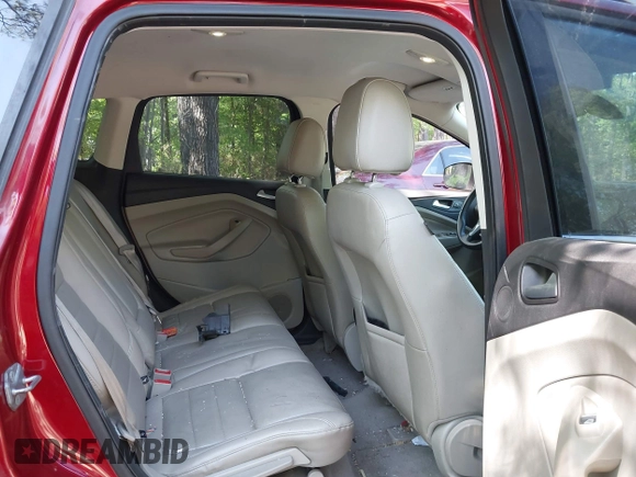 2014 Ford Escape Titanium with VIN 1FMCU9JX7EUB68165, listed as a IAAI auction lot 42141235 with 172,041 mi miles and . Bid and sale history available at DreamBid. Image 8.