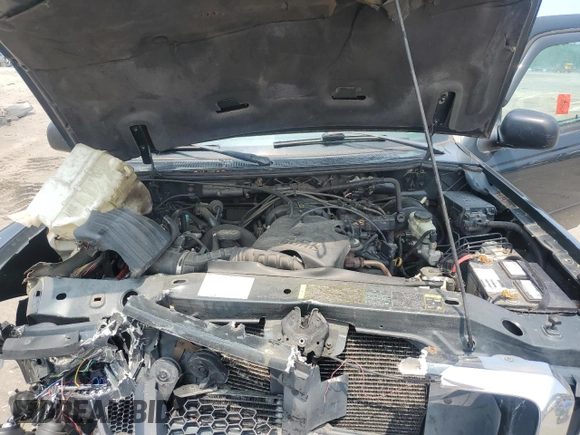 2004 Ford Ranger XL Fleet z VIN 1FTZR45E84TA02334, wystawiony jako Copart lot #59348615 z przebiegiem 223 780 mil mil oraz Szkoda całkowita • Salvage title. Historia ofert i sprzedaży dostępna na DreamBid. Obrazek 11.