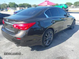 2016 Infiniti Q50 Red Sport 400 with VIN JN1FV7AR4GM451987, listed as a IAAI auction lot 41891826 with 64,931 mi miles and . Bid and sale history available at DreamBid. Image 4.