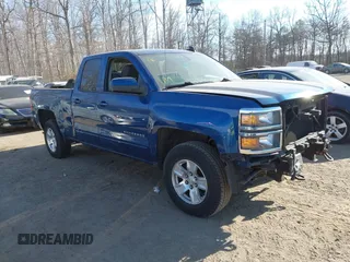 2015 Chevrolet Silverado 1500 LT with VIN 1GCVKREH4FZ257122, listed as a IAAI auction lot 41641364 with 123,243 mi miles. Bid and sale history available at carsss.com. Image 1.