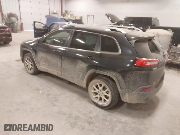 2015 Jeep Cherokee Latitude with VIN 1C4PJLCS8FW689849, listed as a IAAI auction lot 42144161 with 138,740 mi miles and . Bid and sale history available at carsss.com. Image 3.