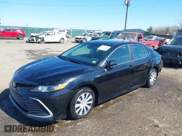 2021 Toyota Camry Hybrid LE with VIN 4T1C31AK4MU553612, listed as a IAAI auction lot 41609111 with 34,399 mi miles. Bid and sale history available at carsss.com. Image 18.