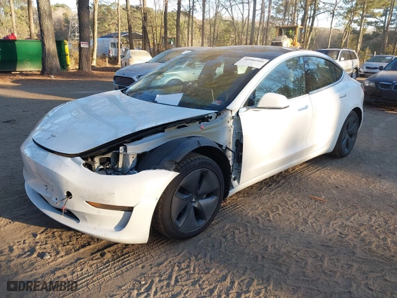 2020 Tesla Model 3 Standard Range Plus with VIN 5YJ3E1EA6LF709009, listed as a IAAI auction lot 40986966 with 116,495 mi miles. Bid and sale history available at carsss.com. Image 23.