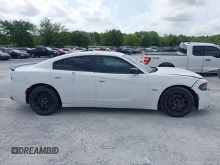 2018 Dodge Charger R/T with VIN 2C3CDXCT4JH273914, listed as a IAAI auction lot 42124971 with 112,742 mi miles and . Bid and sale history available at DreamBid. Image 13.