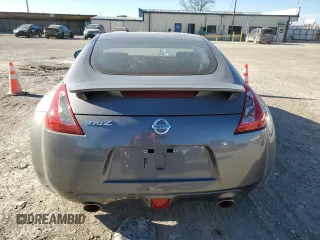 2014 Nissan 370Z Nismo with VIN JN1AZ4EH6EM633797, listed as a Copart auction lot 87879675 with 21,410 mi miles and Salvage Title. Bid and sale history available at DreamBid. Image 6.