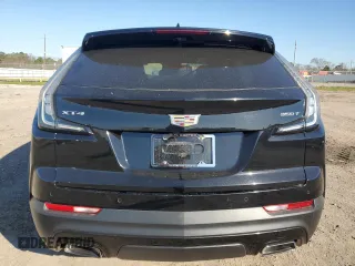 2020 Cadillac XT4 FWD Sport with VIN 1GYFZER42LF060280, listed as a Copart auction lot 48710445 with 69,964 mi miles and Salvage title. Bid and sale history available at DreamBid. Image 6.