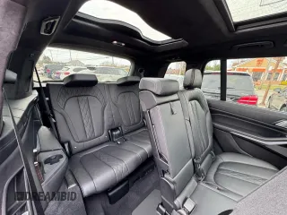 2020 BMW X7 xDrive40i z VIN 5UXCW2C07L9B87158, wystawiony jako Copart lot #59568955 z przebiegiem 92 965 mil mil oraz Czysty tytuł • Clean title. Historia ofert i sprzedaży dostępna na DreamBid. Obrazek 7.