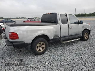 2000 Ford F-150 XL z VIN 2FTRX07L1YCA33404, wystawiony jako Copart lot #51214145 z przebiegiem Nie podano mil oraz Szkoda całkowita • Salvage title. Historia ofert i sprzedaży dostępna na DreamBid. Obrazek 3.