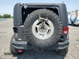 2016 Jeep Wrangler Rubicon z VIN 1C4BJWCG3GL275971, wystawiony jako Copart lot #60329125 z przebiegiem 25 956 mil mil oraz Szkoda całkowita • Salvage title. Historia ofert i sprzedaży dostępna na DreamBid. Obrazek 6.