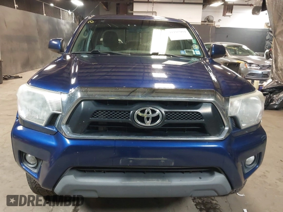 2014 Toyota Tacoma with VIN 3TMLU4EN4EM156933, listed as a IAAI auction lot 41197904 with 128,183 mi miles. Bid and sale history available at carsss.com. Image 12.