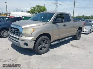 2007 Toyota Tundra SR5 with VIN 5TFRT54167X007311, listed as a IAAI auction lot 41937779 with 155,756 mi miles. Bid and sale history available at carsss.com. Image 2.
